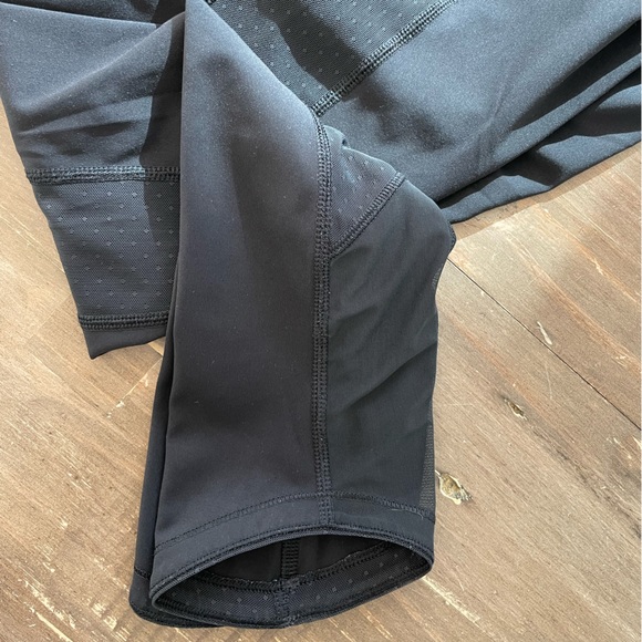 Lululemon black leggings with mesh accent. Size 4. Great condition - Picture 2 of 5